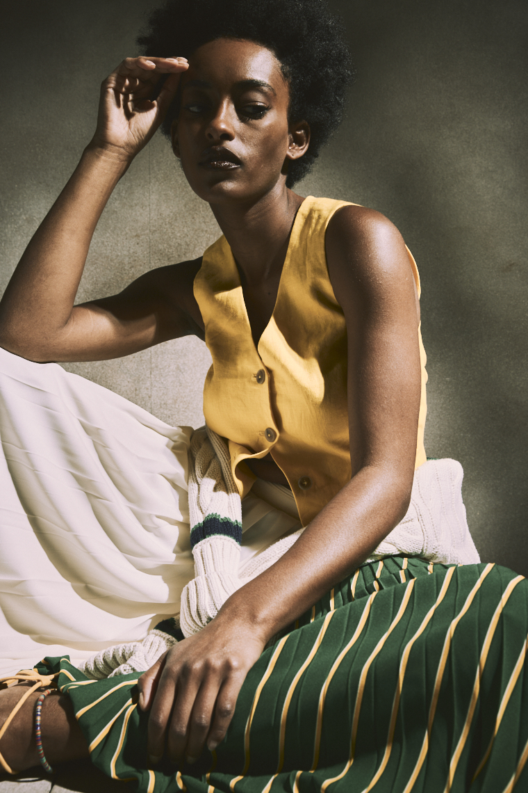 Black Model in a cool pose wering Banana republic by Shane O